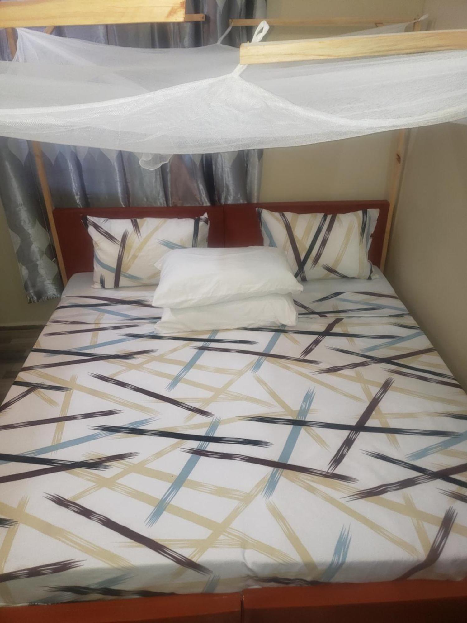 L&J Modern Backpackers Bnb Дар-эс-Саламе Экстерьер фото